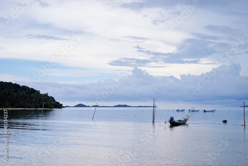 Beautiful landscape with traditional longtail boat on the beach. Samui, Thailand. © luengo_ua