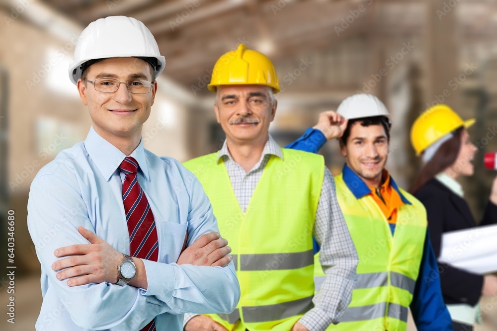 Group of factory workers together at work in industry factory, Group of factory workers together at work in industry factory,