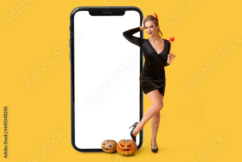 Sexy young woman dressed fo...