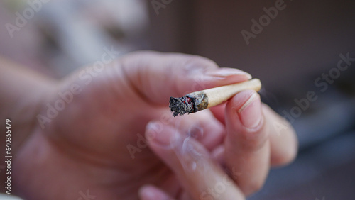 Burning joint in between fingers