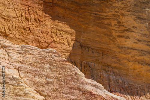 Fototapeta Naklejka Na Ścianę i Meble -  Abstract Rustrel canyon ocher cliffs landscape. Provencal Colorado near Roussillon, Southern France.