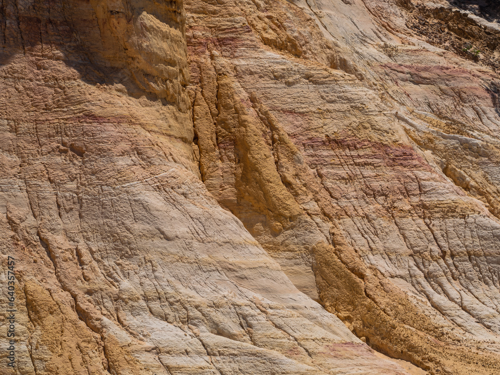 Naklejka premium Abstract Rustrel canyon ocher cliffs landscape. Provencal Colorado near Roussillon, Southern France.