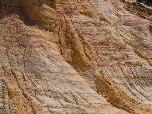 Abstract Rustrel canyon ocher cliffs landscape. Provencal Colorado near Roussillon, Southern France. © Daniel