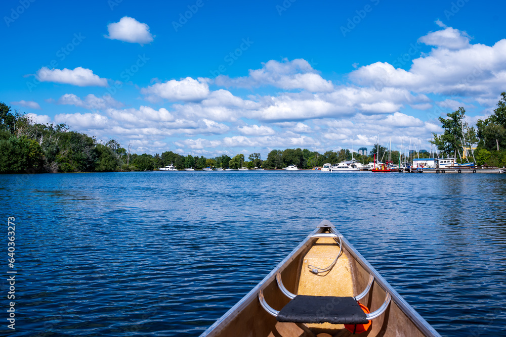 view from a canoe: looking west toward moored pleasure boats on the toronto islands in summer room for text