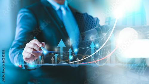 Fotografi Interest rate and dividend concept, businessman calculating income and return on investment, save, income, return, compensation fund, investment, dividend tax, stock market, saving, trade