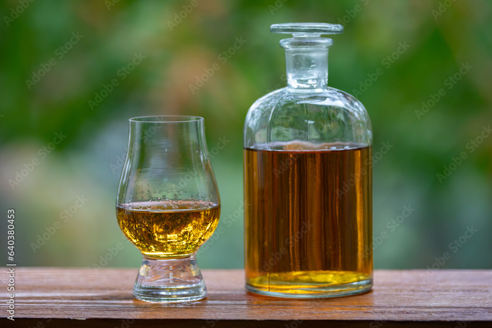 Single malt scotch whisky in selective focus and minimalistic photo. Space for text Single malt scotch whisky in selective focus and minimalistic photo. Space for text
