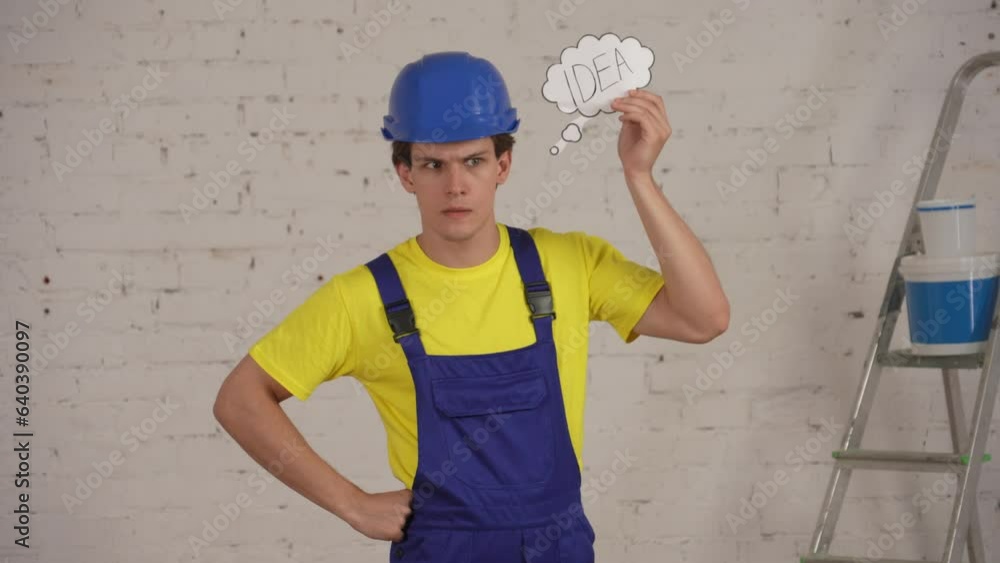 Medium video of a young construction worker standing in the room under renovation, getting an idea and raising his finger up. Medium video of a young construction worker standing in the room under renovation, getting an idea and raising his finger up.