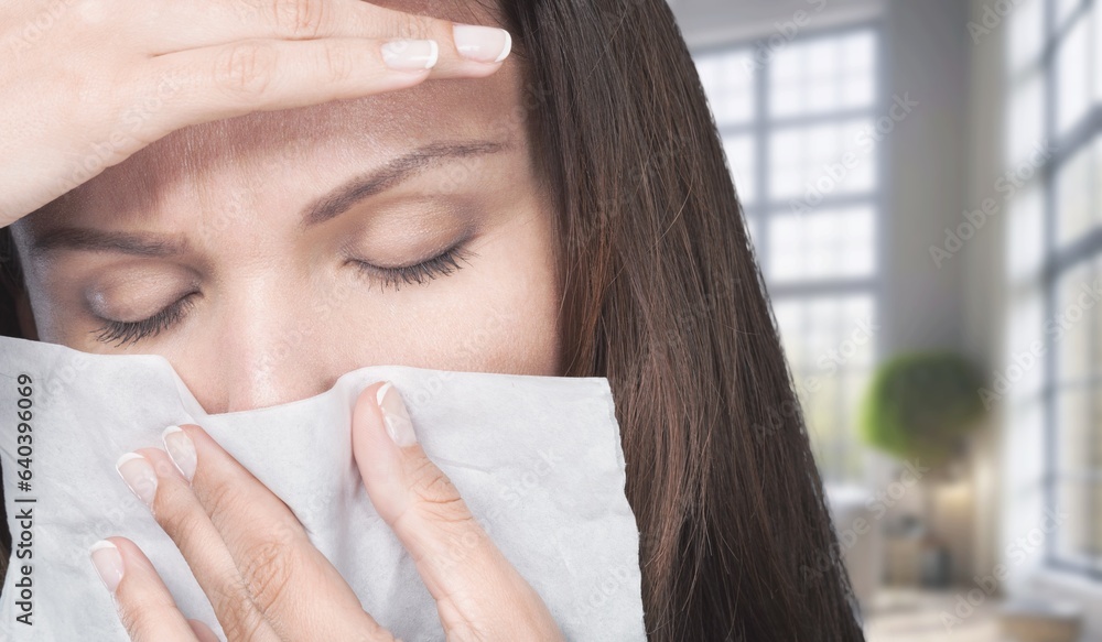 An attack of allergies, woman on the sofa coughing, AI generated image