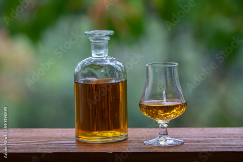 Single malt scotch whisky in selective focus and minimalistic photo. Space for text © Adilson