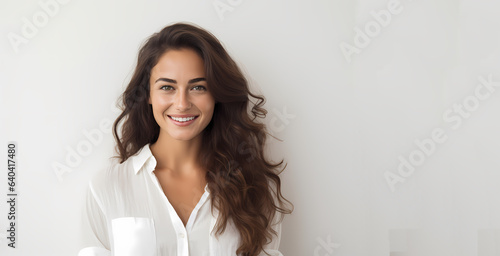 portrait of a happy woman on a gray background photo