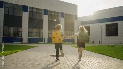 Happy School Kids Running To Lessons In Morning, Following Back View, Education And Development