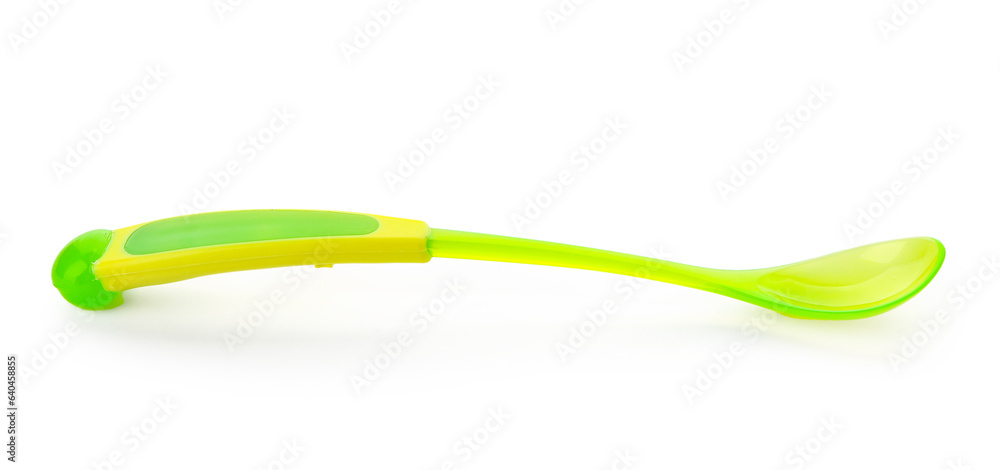 Green plastic spoon for baby isolated on white background Green plastic spoon for baby isolated on white background