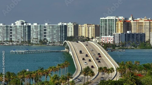 Development of housing and transportation in the US. Above view of Sarasota city, Florida with waterfront office highrise buildings and John Ringling Causeway leading from downtown to St. Armands Key photo