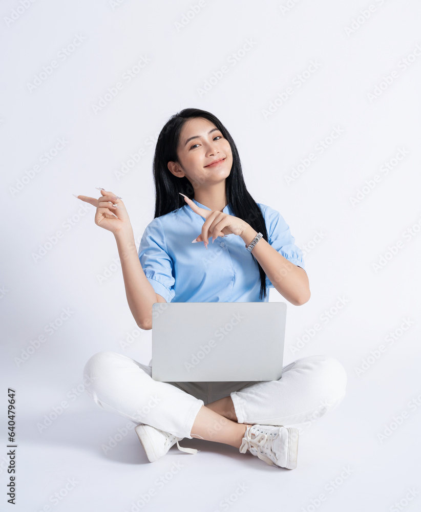Photo of young Asian girl on white background Photo of young Asian girl on white background