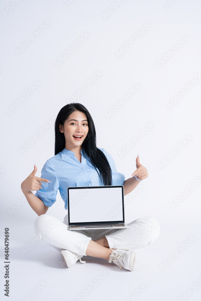 Photo of young Asian girl on white background Photo of young Asian girl on white background