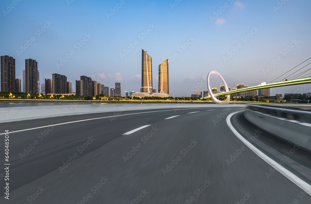 Fototapeta premium The curved approach bridge of the highway overpass leading to the city