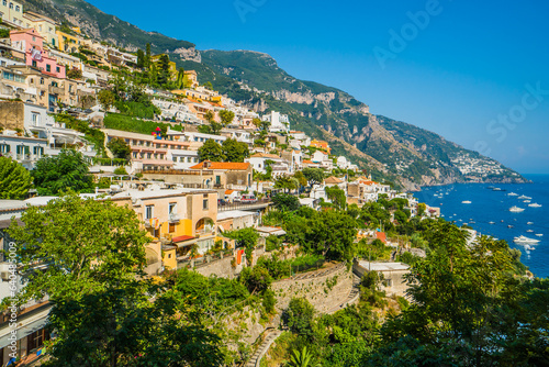 The Amalfi Coast is a breathtaking stretch of coastline in southern Italy  known for its vertiginous cliffs adorned with colorful villages  turquoise waters  and lush terraced gardens. Its beauty capt