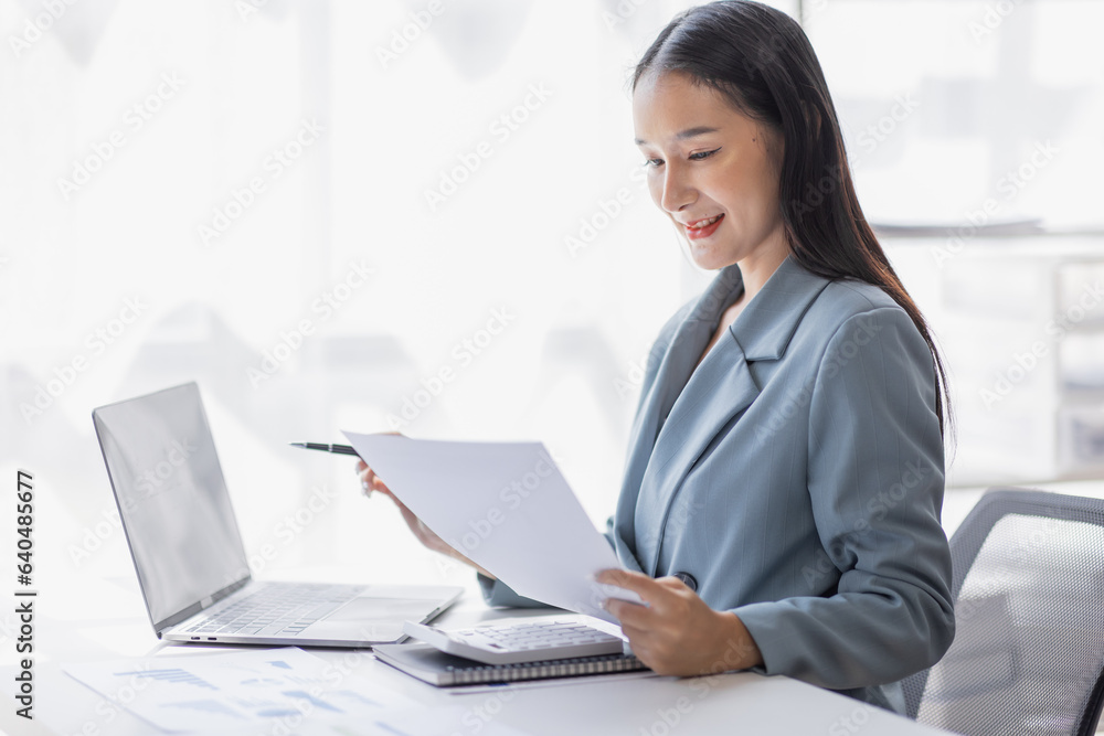 Business Documents, Auditor business asian woman checking searching document legal prepare paperwork or report for analysis TAX, accountant Documents data contract partner deal in workplace office. Business Documents, Auditor business asian woman checking searching document legal prepare paperwork or report for analysis TAX, accountant Documents data contract partner deal in workplace office.