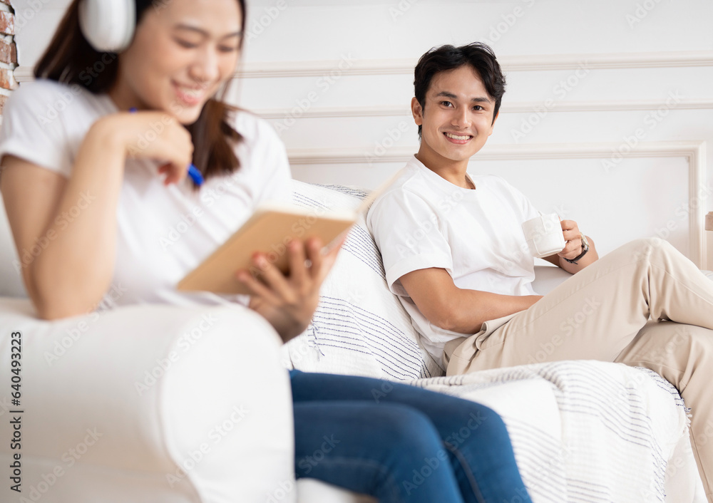 Photo of young Asian couple at home Photo of young Asian couple at home