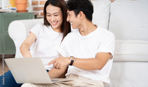 Photo of young Asian couple at home © Timeimage