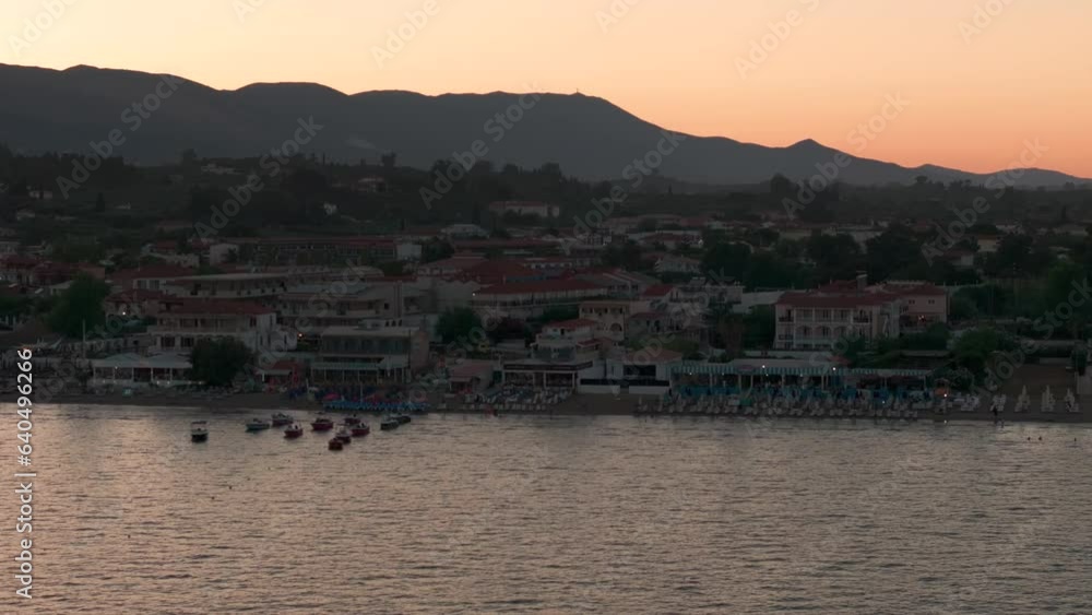 Drone Shot of Sunset Above Laganas Town, Zakynthos Island, greece