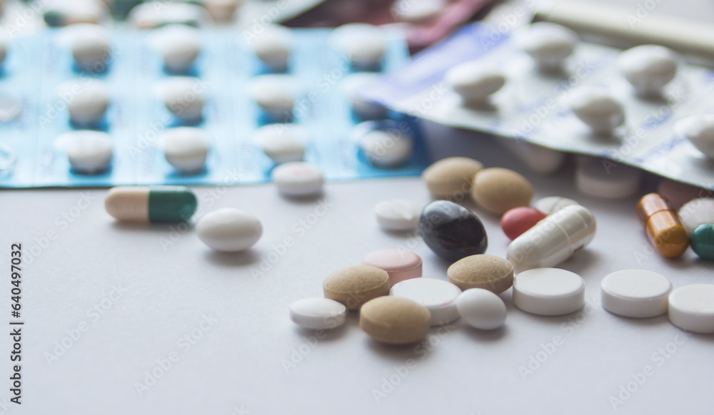Several pills and capsules on the table. medicine. drugs Several pills and capsules on the table. medicine. drugs