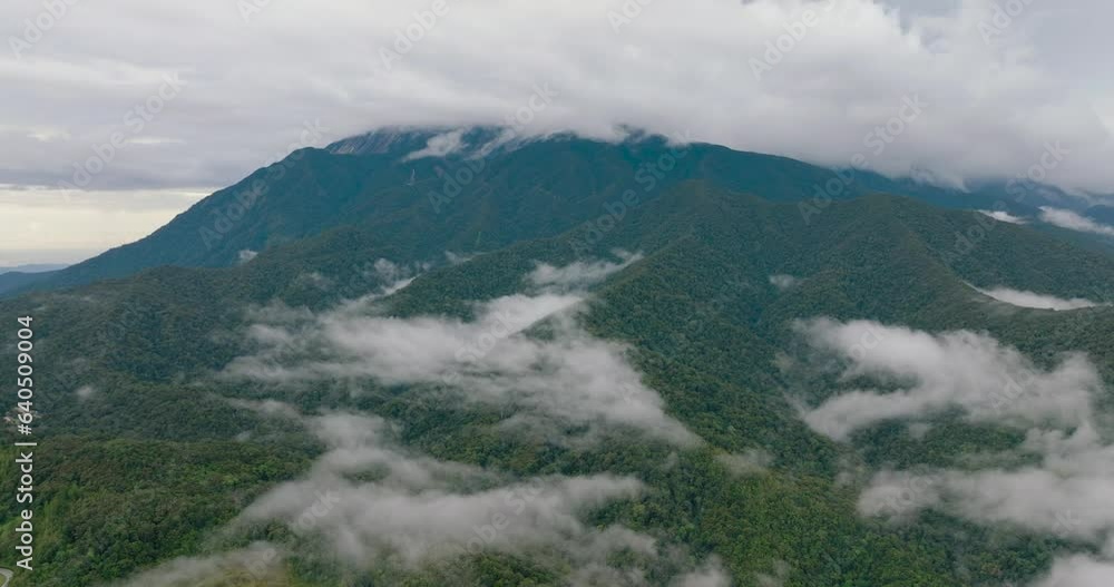 Mountain peaks covered with forest from above. Sabah, Malaysia. Mountain peaks covered with forest from above. Sabah, Malaysia.