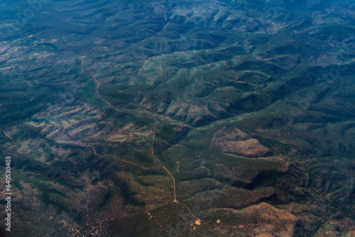 Aerial view of rippling landscape from high altitude