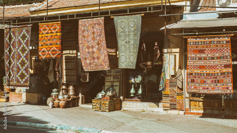 Bergama carpets. Antique shop at the street of Bergama. Travelling and shoping, traditional turkish sovenirs. Bergama, Turkey (Turkiye) Bergama carpets. Antique shop at the street of Bergama. Travelling and shoping, traditional turkish sovenirs. Bergama, Turkey (Turkiye)