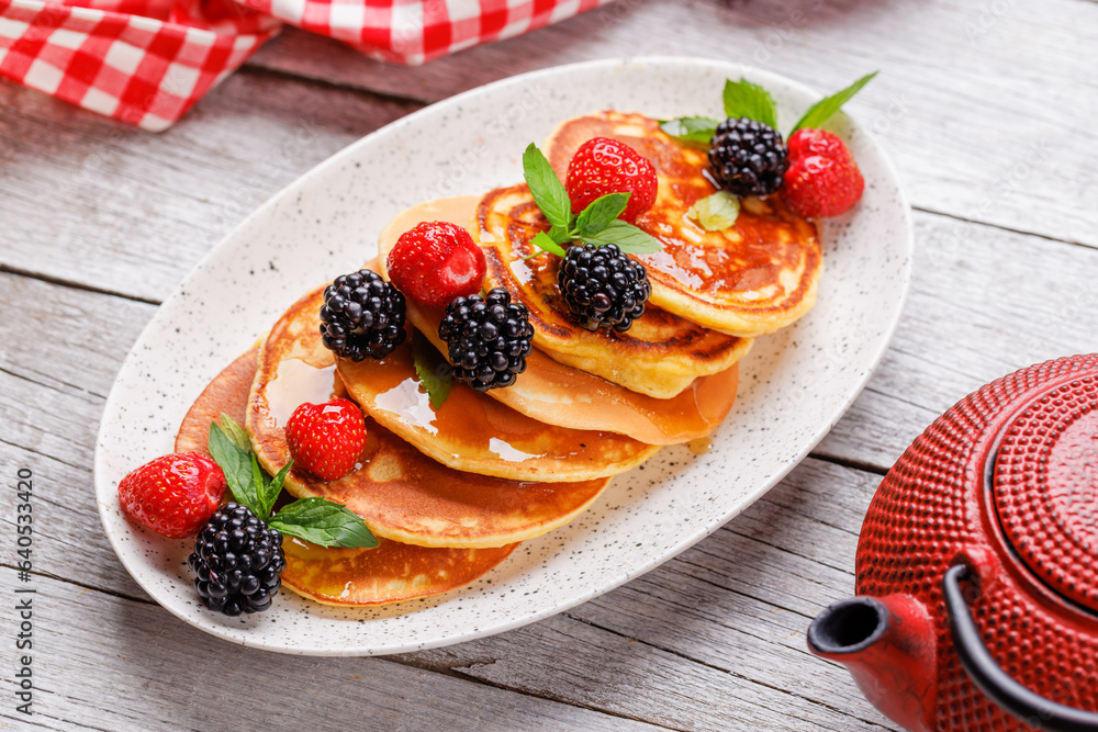 Tasty homemade pancakes with berries Tasty homemade pancakes with berries