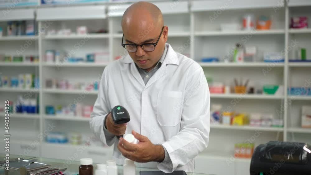 Professional confident Pharmacist in checking stock inventory in medical store using tablet at a pharmacy. Medical healthcare concept.
Professional confident Pharmacist in checking stock inventory in medical store using tablet at a pharmacy. Medical healthcare concept.