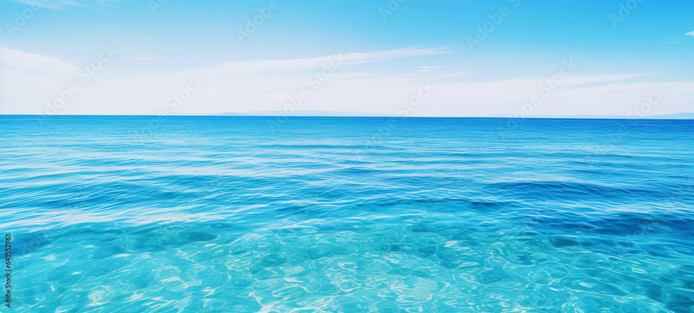 Tranquil sea water surface on coral, and sea fish tropical blue ocean underwater background