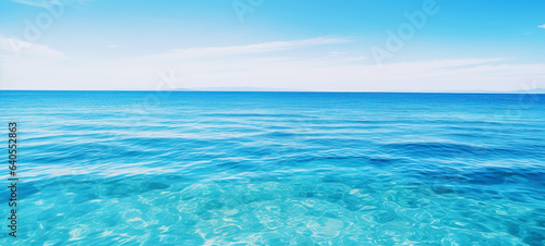 Tranquil sea water surface on coral, and sea fish tropical blue ocean underwater background