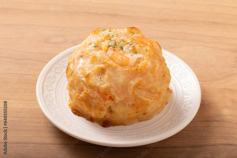 ポテトのチーズ焼き　オマールソース仕立て