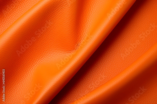 Texture orange leather or leatherette fabric for clothing bags and shoes and furniture photo