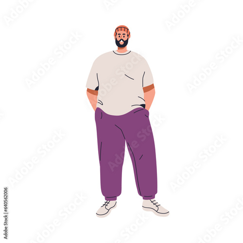 Happy man with fat plus-size body. Young chubby chunky person in modern loose casual clothes. Smiling plump guy standing with hands in pockets. Flat vector illustration isolated on white background