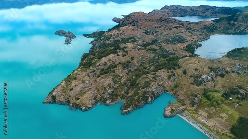 Patagina, lake of General Carrera in Chile.  filmed with a drone. The reflexion onto the water are showing the clouds.