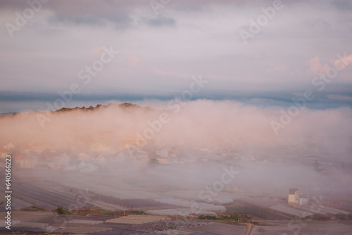 The houses in the suburbs of Da Lat are engulfed in the morning mist