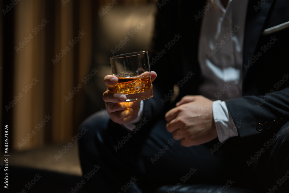 Businessmen in suits drinking  Celebrate whiskey