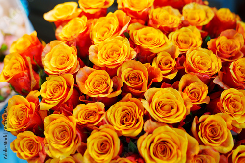 Large and beautiful bouquet of orange yellow roses. 