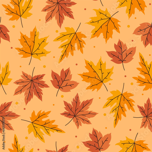 Seamless pattern with autumn maple leaves. Vector graphics.