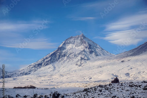 Snowy covered Kamen volcano in Kamchatka photo