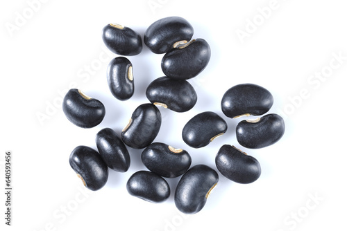 close-up top view raw black beans dried vegetable seeds healthy vegetarian food isolated on white background