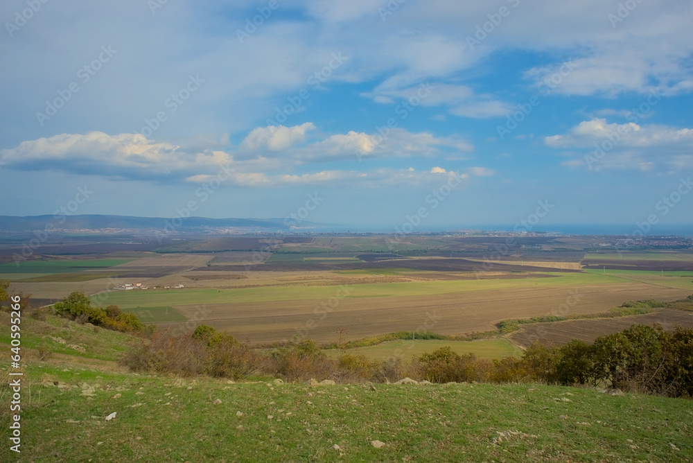 Panoramic view of the endless horizon of fields on a clear sunny day Panoramic view of the endless horizon of fields on a clear sunny day