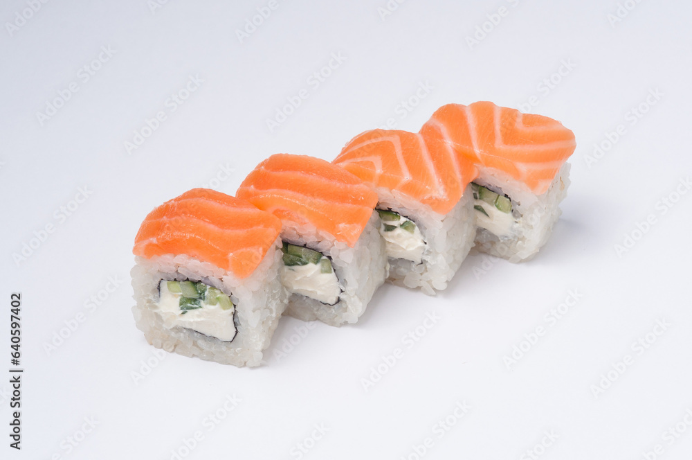 philadelphia roll with cucumber on a light background philadelphia roll with cucumber on a light background