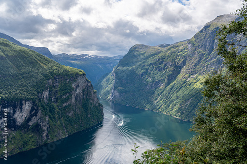 The famouse Geiranger fjord in norway, seen from a mountain road above the clouds