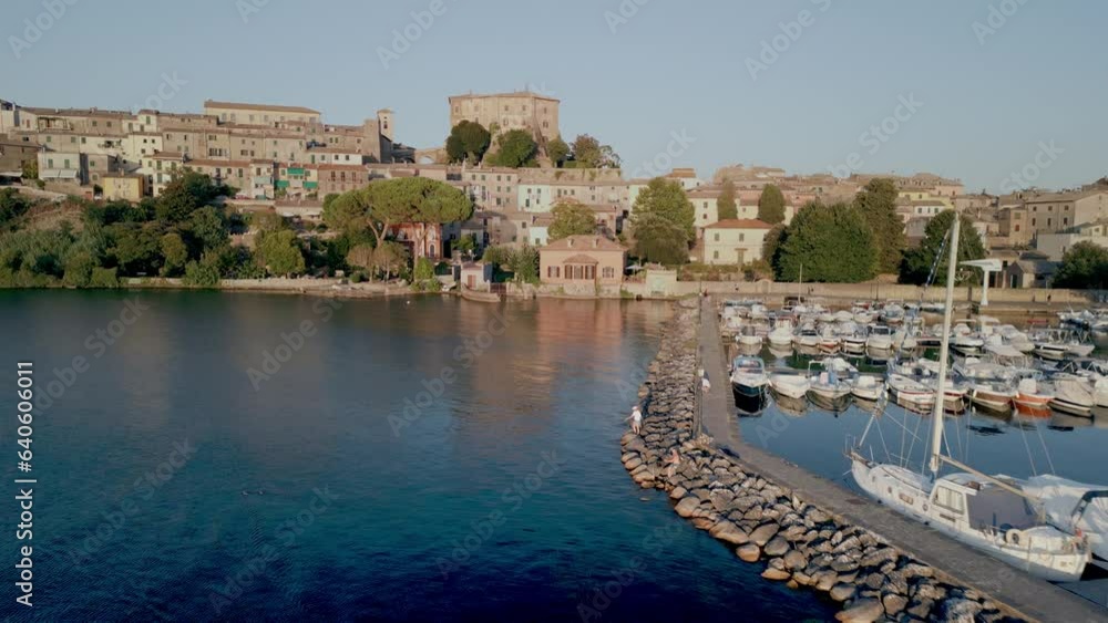 Italy, Capodimonte peninsula , Bolsena Lake, from the marina over the old village Italy, Capodimonte peninsula , Bolsena Lake, from the marina over the old village