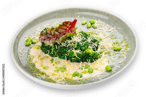 Steamed broccolli with white sauce and beans. Isolated image on a white background. photo