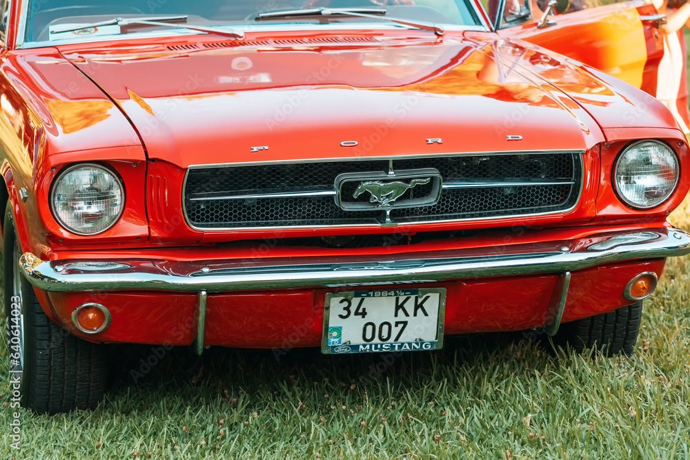 01 July 2023, Antalya, Turkey: A classic red Ford Mustang, a symbol of ...