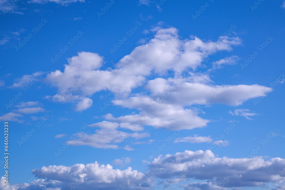 Summer evening sky in the picturesque clouds, lit by the rays of the setting sun. Summer evening sky in the picturesque clouds, lit by the rays of the setting sun.